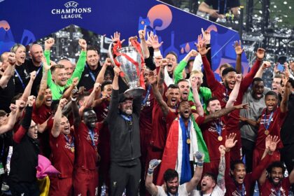 Jurgen Klopp lifts the Champions League trophy after Liverpool beat Tottenham to win the 2