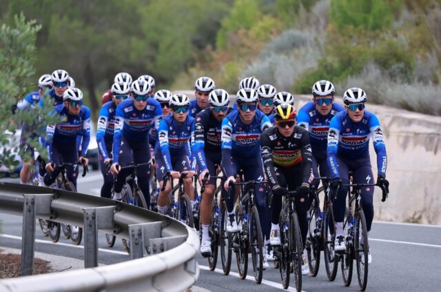 Leader of the pack: Remco Evenepoel (centre) and teammates take part in a training ride in