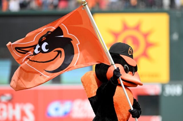 Major League Baseball's Baltimore Orioles, whose mascot waves a logo flag celebrating a vi