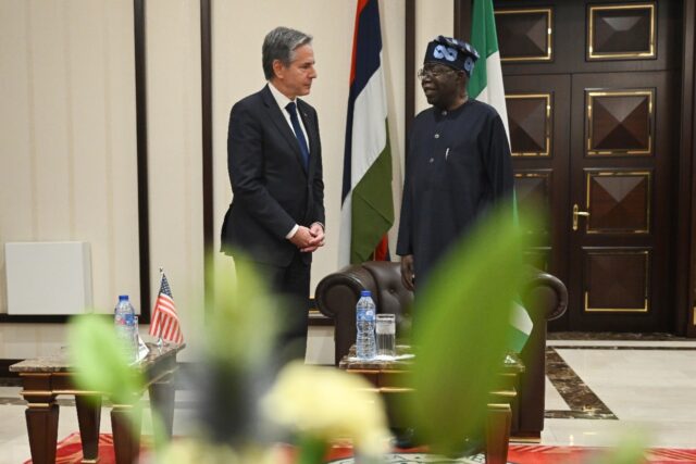 Nigerian President Bola Tinubu speaks with US Secretary of State Antony Blinken at the Pre