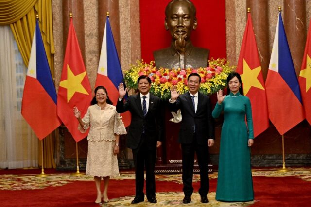 Philippine's Ferdinand Romualdez Marcos Jr (2nd L) and his wife Louise Araneta-Marcos (L)