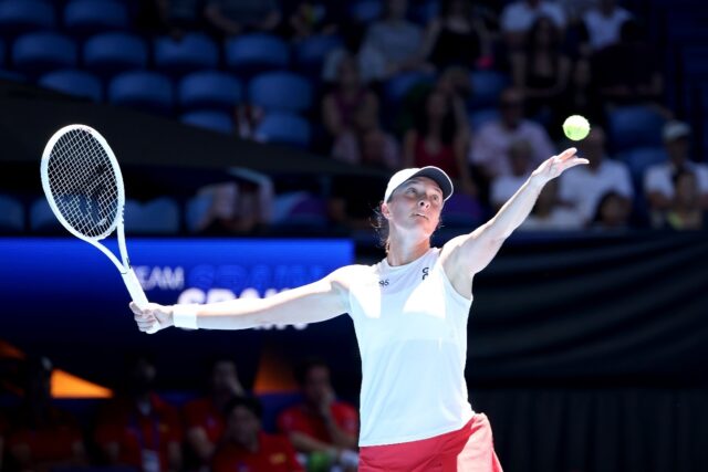 Poland’s dominant Iga Swiatek serves against Spain’s Sara Sorribes Tormo at the United