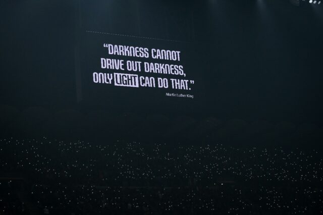 Power of words: A quote by Martin Luther King is displayed on a giant screen at the San Si