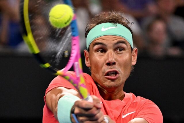 Spain's Rafael Nadal hits a return against Austria's Dominic Thiem at the Brisbane Interna