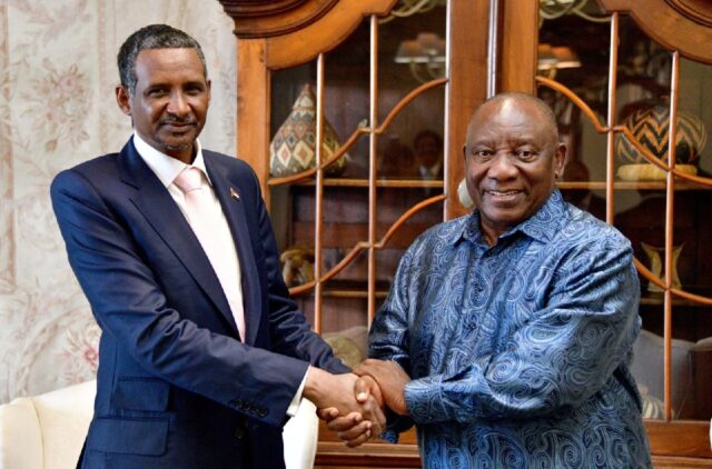 Sudan's paramilitary chief Mohamed Hamdan Daglo (L), with South African President Cyril Ra
