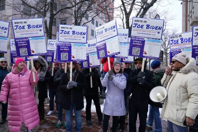 Supporters demonstrate at a Joe Biden Write-In Rally in Manchester, New Hampshire, on Janu