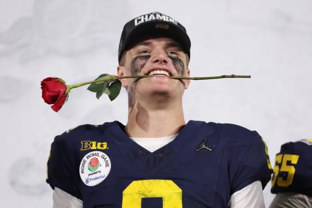 University of Michigan quarterback J.J. McCarthy celebrates after the undefeated Wolverine