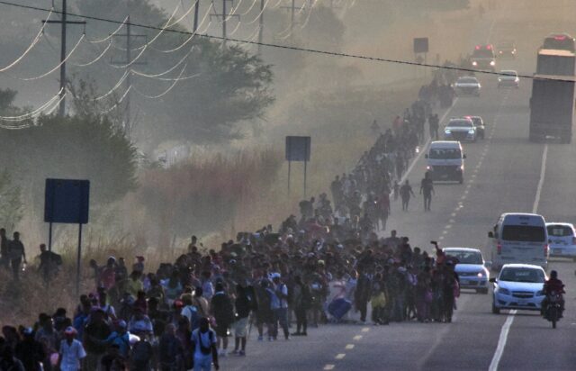 US-bound migrants walk in a caravan in Mexico's southern state of Chiapas on January 8, 20