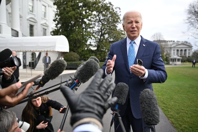 US President Joe Biden speaks to reporters before boarding Marine One on the South Lawn of