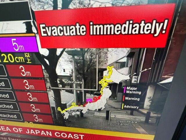 A video image taken in Hong Kong shows a warning message from a live feed on NHK World ask