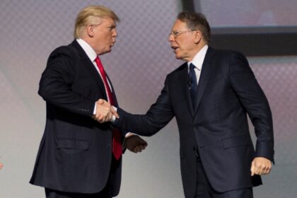 Wayne LaPierre (R) went on trial in New York on Monday accused of using the NRA as a perso