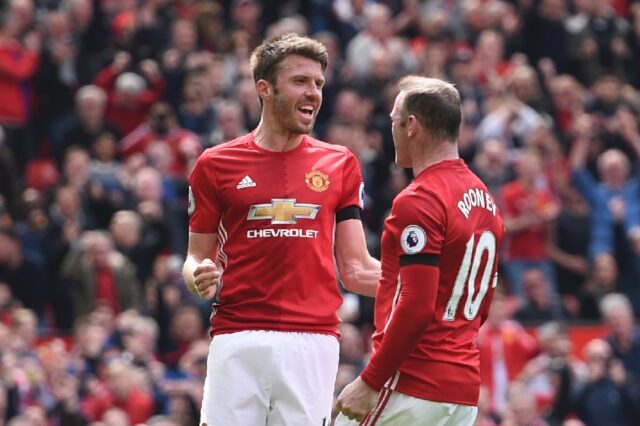 Wayne Rooney (right) and Michael Carrick won multiple trophies together at Manchester Unit