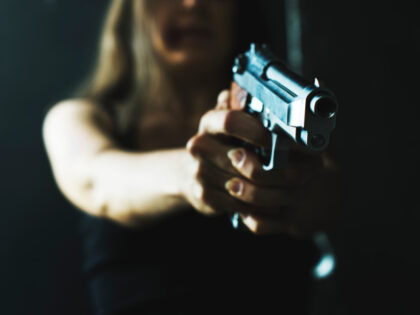 Woman shooting gun