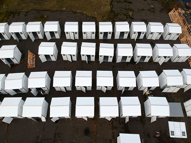 In this aerial photo taken with a drone, pods to be used in homeless camps are constructed