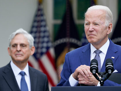 President Joe Biden listens to questions from members of the media after speaking in the R