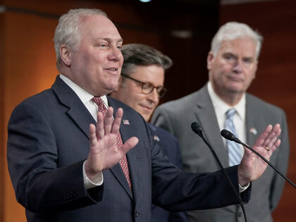 Rep. Steve Scalise, R-La, left, meets with reporters ahead of a crucial vote on a continui