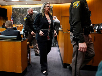 Jennifer Crumbley is escorted out of the Oakland County courtroom, Friday, Feb. 2, 2024, i