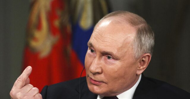 Putin Claims Russia Won't Invade Poland to Start WW3, Says NATO Using Him to 'Extort' Taxpayers