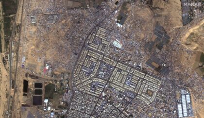 This satellite image provided by Maxar Technologies shows an overview of tents, shelters a