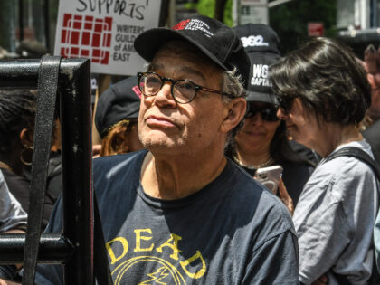 Former Senator Al Franken with Writers Guild of America members and supporters on a picket