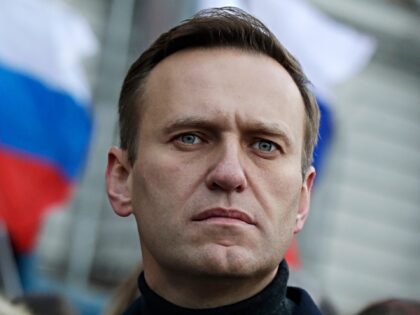 FILE - Russian opposition activist Alexei Navalny takes part in a march in memory of oppos