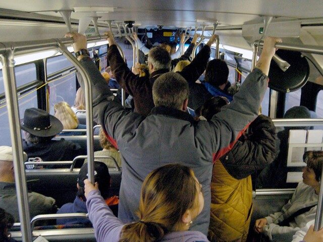 Packed bus is heading to downtown Denver from Simms and 6th bus station in Lakewood on Mon