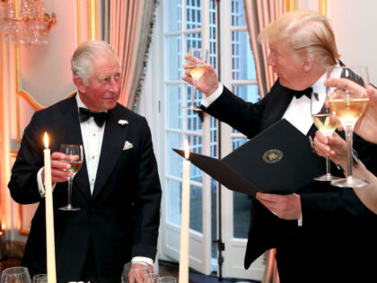 Britain's Prince Charles, Prince of Wales (L) attneds a dinner hosted by US President