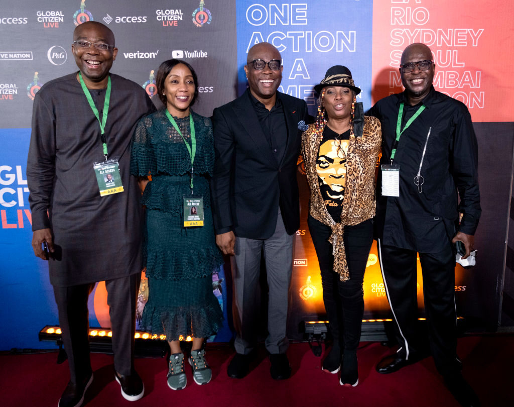 LAGOS, NIGERIA - SEPTEMBER 18: (L-R) Aigboje Aig-Imoukhuede, Miamuna Maibe, Herbert Onyewumbu Wigwe, and Yeni Kuti attend Global Citizen Live, Lagos on September 18, 2021 in Lagos, Nigeria. (Photo by Andrew Esiebo/Getty Images for Global Citizen)