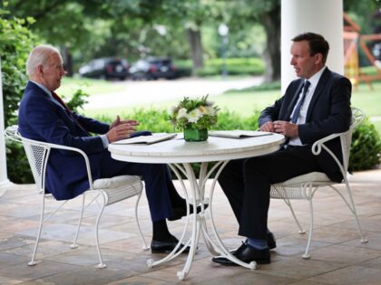 border - WASHINGTON, DC - JUNE 07: U.S. President Joe Biden (L) talks with Sen. Chris Murp