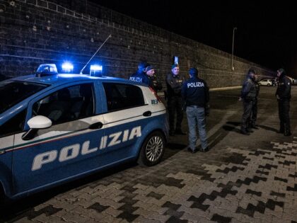 CATANIA, ITALY - NOVEMBER 06: Police at the port of Catania kept journalists who had arriv
