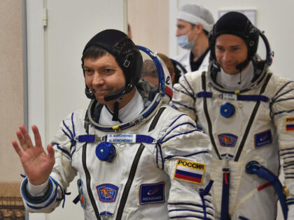 Russian Roscosmos cosmonauts Oleg Kononenko (L) and Nikolai Chub, members of the Internati