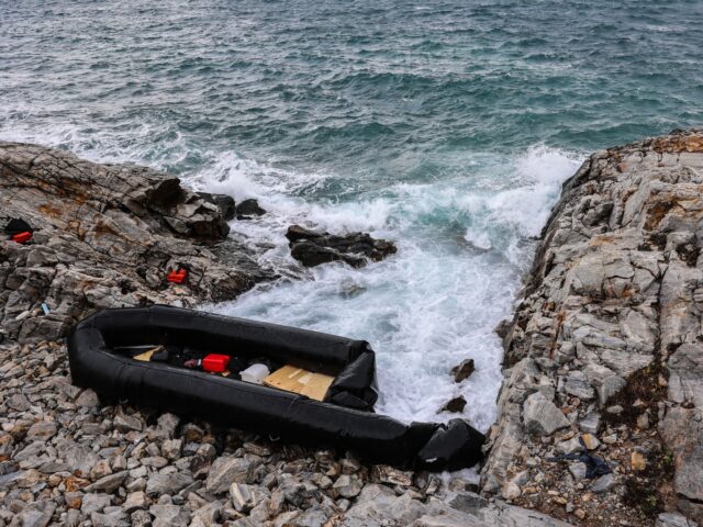 TOPSHOT - This photograph taken on January 10, 2024, shows an inflatable dinghy washed up