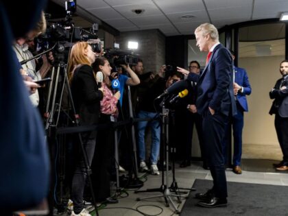 PVV party leader Geert Wilders (2ndL) addresses the press prior to a conversation with Dut