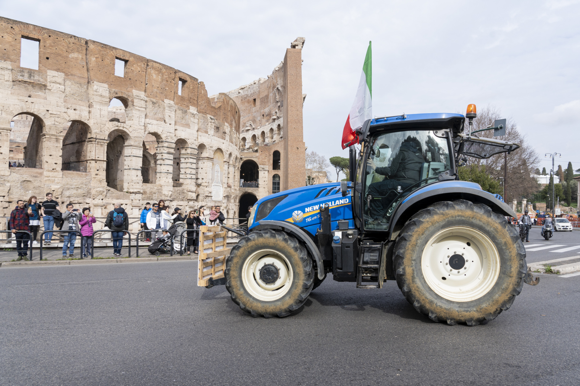 ROME, ITALY - 2024/02/09: Italian farmers drive their tractor on the street during the rally. Hundreds of tractors gathered outside Rome driven by farmers as part of a European wave of protests against the cutting of their produce by cheaper imports from third countries, rising fuel costs and the impact of government measures. (Photo by Stefano Costantino/SOPA Images/LightRocket via Getty Images)