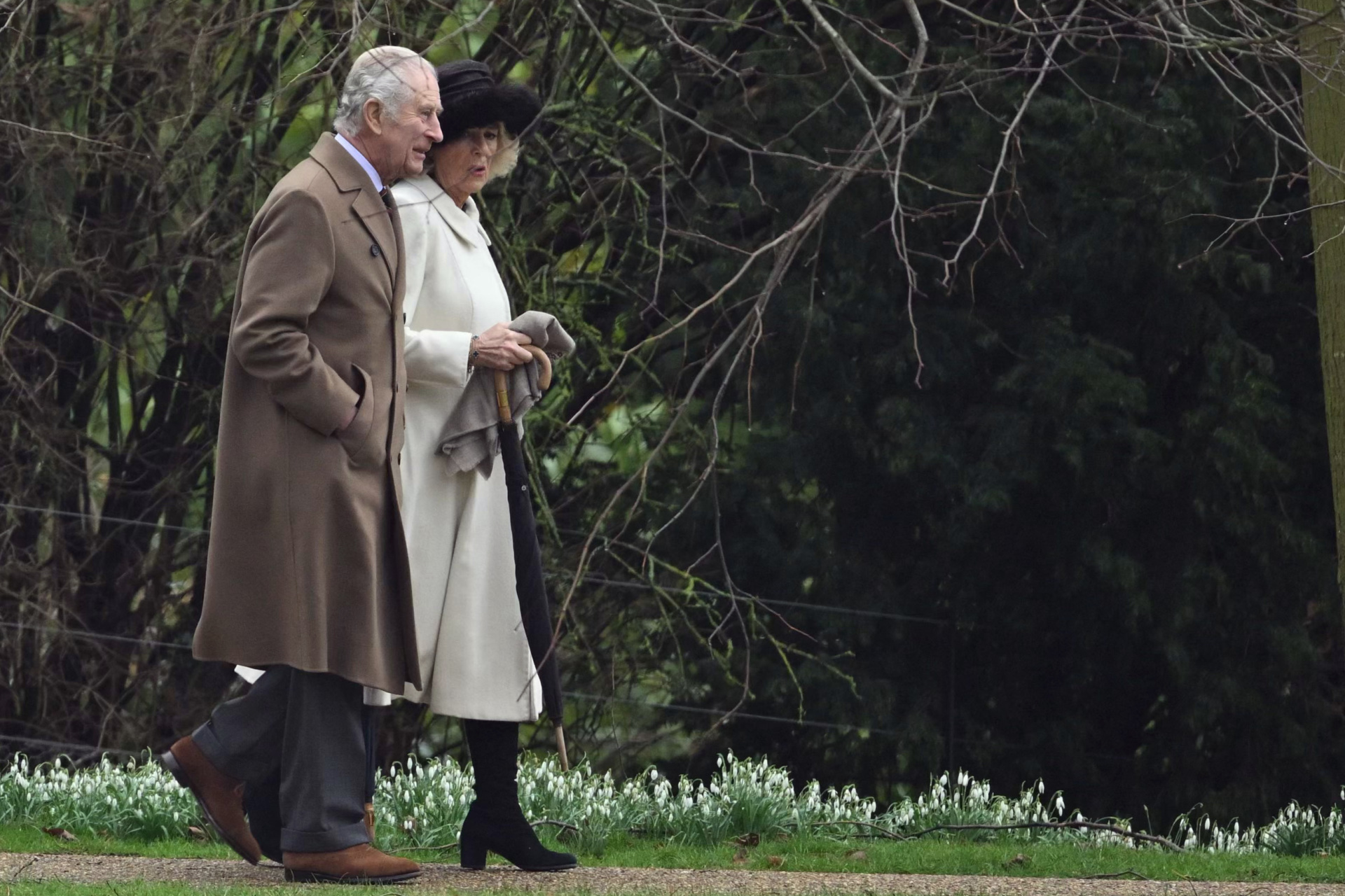 Britain's King Charles III and Britain's Queen Camilla arrive at St Mary Magdalene Church on the Sandringham Estate in eastern England on February 11, 2024. Britain's King Charles III on Saturday expressed his 