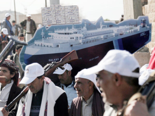 SANA'A, YEMEN - FEBRUARY 7: Yemeni tribesmen belonging to the Houthi movement carry a