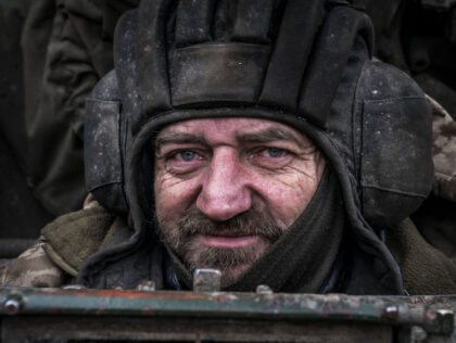DONETSK OBLAST, UKRAINE - FEBRUARY 16: A Ukrainian soldier is seen inside a tank as they p