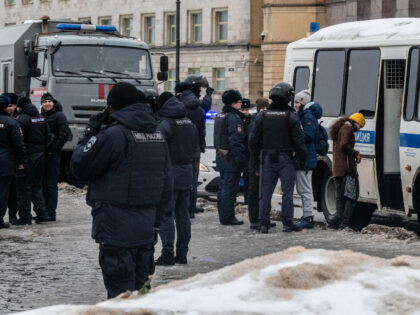 ST PETERSBURG, RUSSIA - 2024/02/17: Police detain people after laying flowers at a monumen