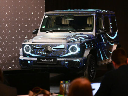 A new electric G-Class model stands in the conference room at the annual press conference