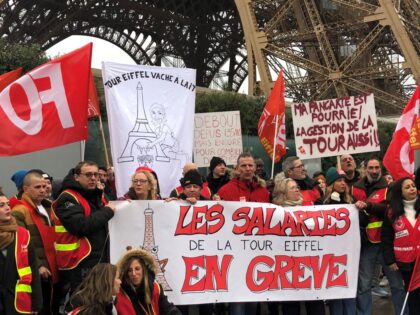 22 February 2024, France, Paris: Eiffel Tower workers demonstrate in front of the landmark