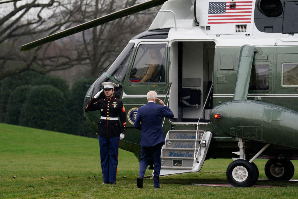 US President Joe Biden, right, salutes on the South Lawn of the White House before boarding Marine One in Washington, DC, US, on Wednesday, Feb. 28, 2024. Biden said he is undergoing a physical, a regular check-up during an election season in which voters have expressed concerns about his age and fitness to serve a second term. Photographer: Yuri Gripas/Abaca/Bloomberg via Getty Images