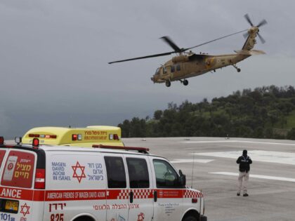 EDITORS NOTE: Graphic content / A militrary helicopter transports from Ziv hospital in Isr