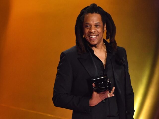 US rapper Jay-Z accepts the Dr. Dre Global Impact Award on stage during the 66th Annual Gr