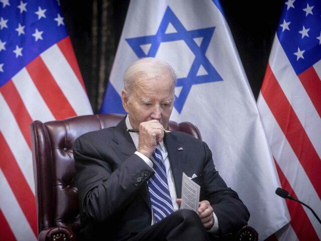 FILE - U.S. President Joe Biden pauses during a meeting with Israeli Prime Minister Benjam