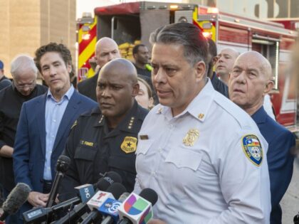 From left, Lakewood Church pastor Joel Osteen, Police Chief Troy Finner, Fire Department C