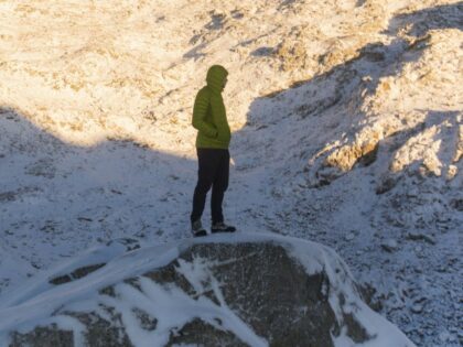 Man standing on on rocky mountain ridge, British Columbia, Canada. (Cavan via Getty)
