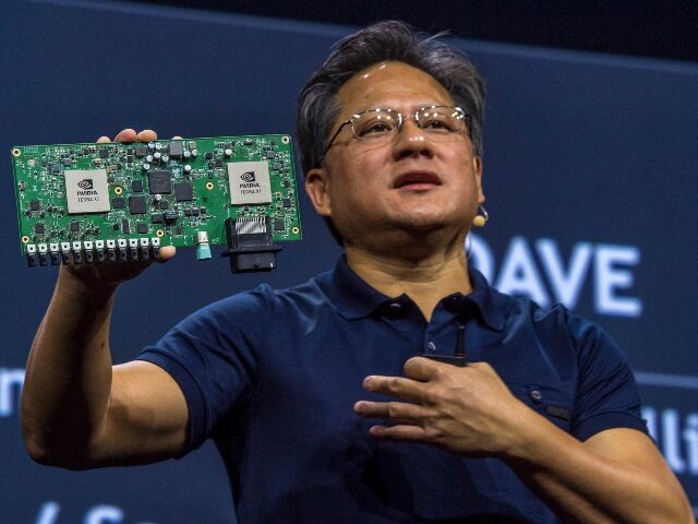 NVidia CEO Jen-Hsun Huang holding GPU