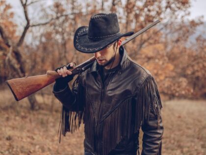 Rancher or Cowboy with shotgun