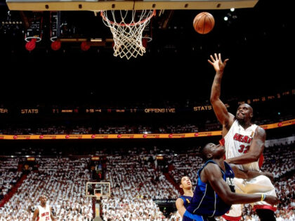 MIAMI - JUNE 18: Shaquille O'Neal #32 of the Miami Heat shoots a hook shot over DeSag