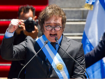 Argentina's newly sworn-in President Javier Milei speaks outside the Congress in Buen